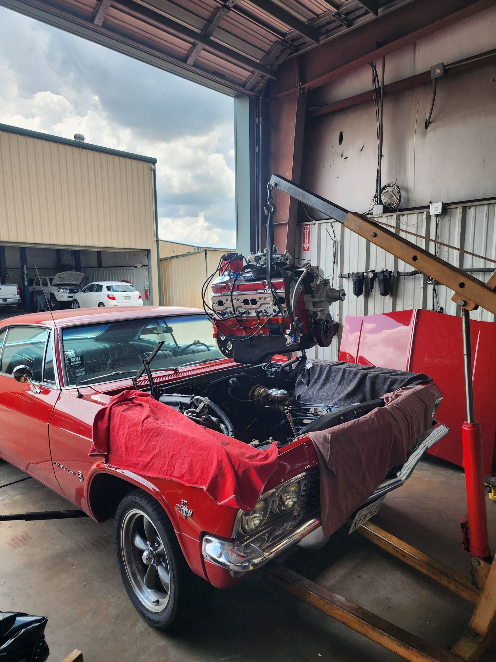 Oil change service performed on a car at Woodlands Car Care & Collision Center
